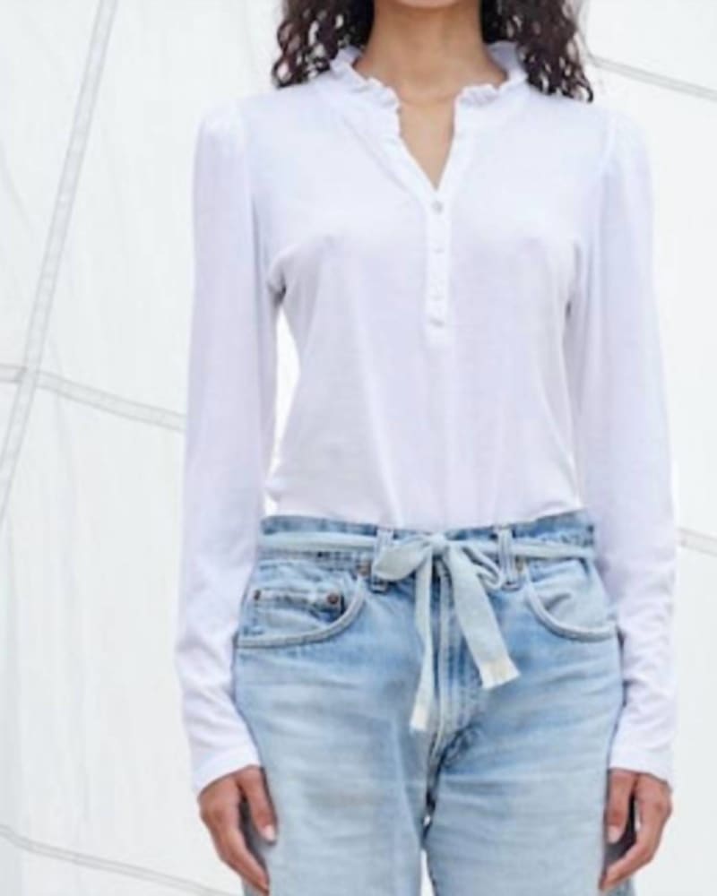 Front of a model wearing a size L Ruffle Neck Henley Top in White in White by Sundry. | dia_product_style_image_id:343792